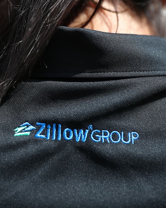 Buy Zillow stock now to profit from 'brighter environment' next year