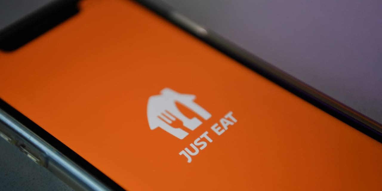 Just Eat Takeaway.com swings to profit, but sees orders fall