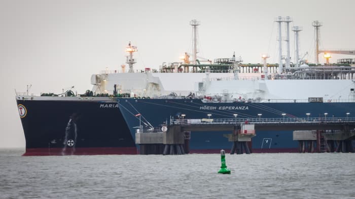 The liquefied natural gas tanker Maria Energy (background) is moored alongside the floating Storage and re-gasification unit vessel Hoegh Esperanza (foreground) at the Uniper LNG terminal in Wilhelmshaven, northern Germany. 