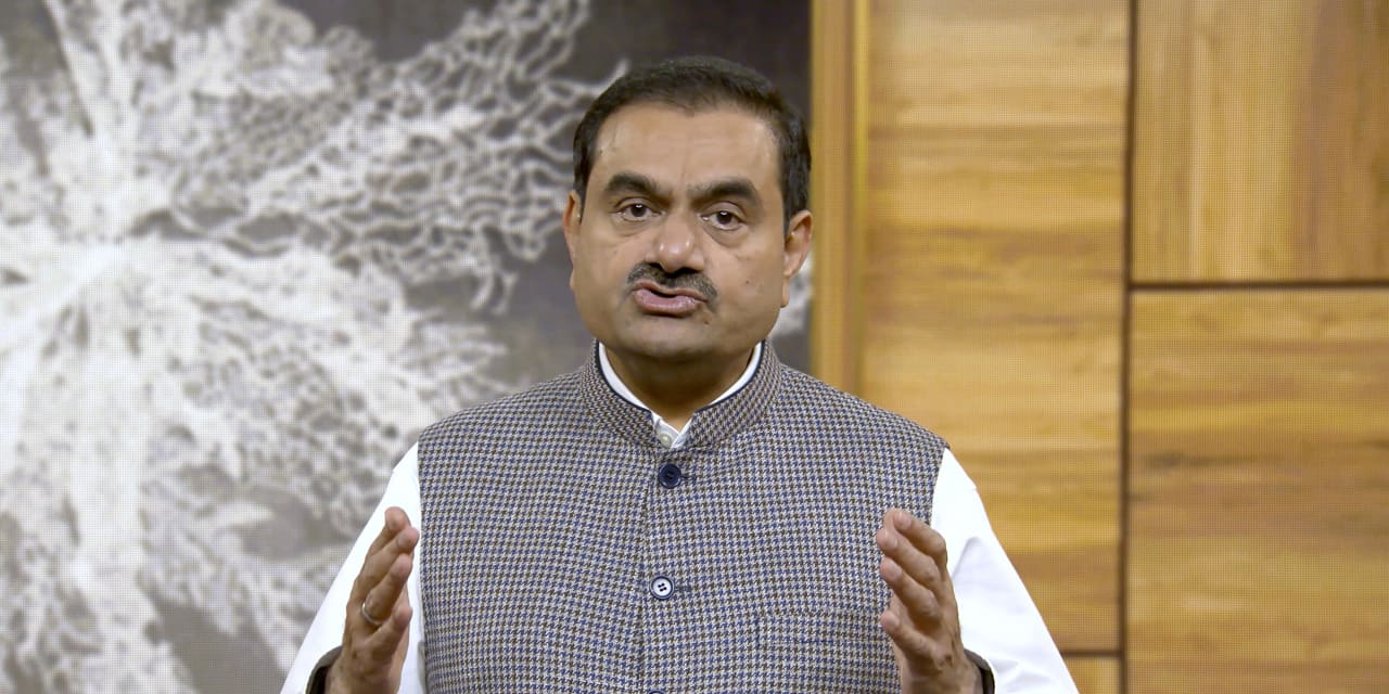 #: Indian regulator said it’s placing extra surveillance measures after more than $100 billion in Adani Group losses