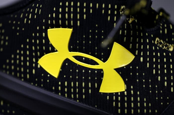 Under Armour stock lower as high promotions and discounts to continue as inventories keep rising -