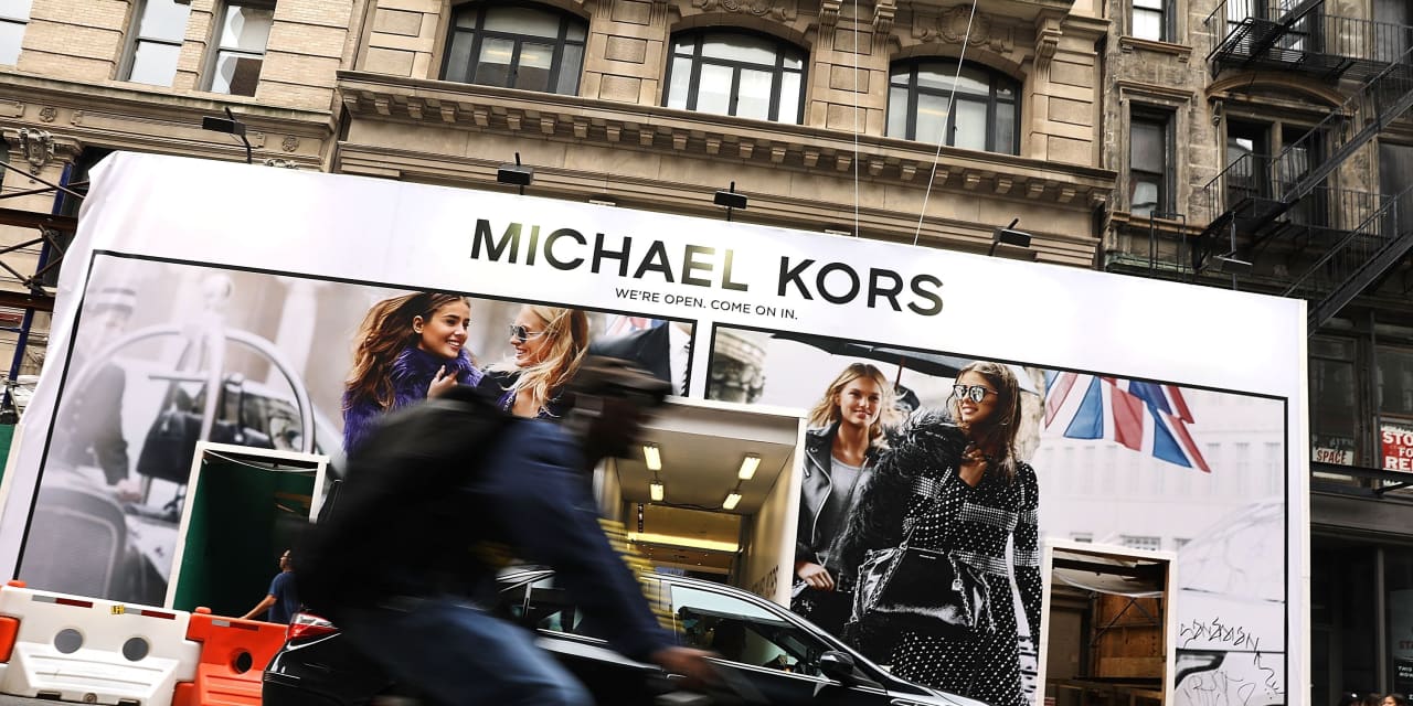 Michael kors deals buys versace wsj