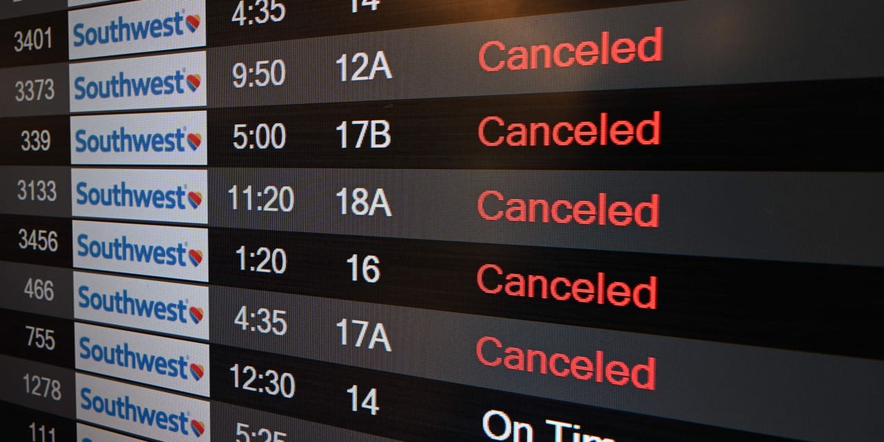 Thousands Of Flights Canceled, Delayed As Winter Storm Blankets Most Of ...