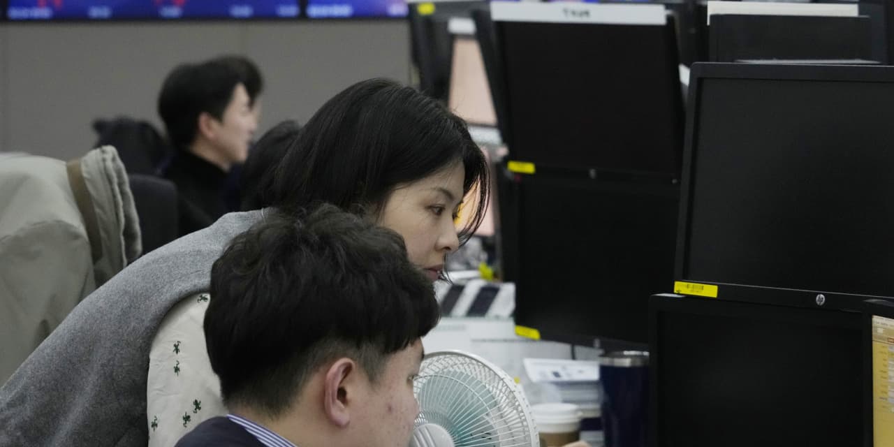Les actions asiatiques mitigées après que Wall Street ait interrompu sa séquence de défaites