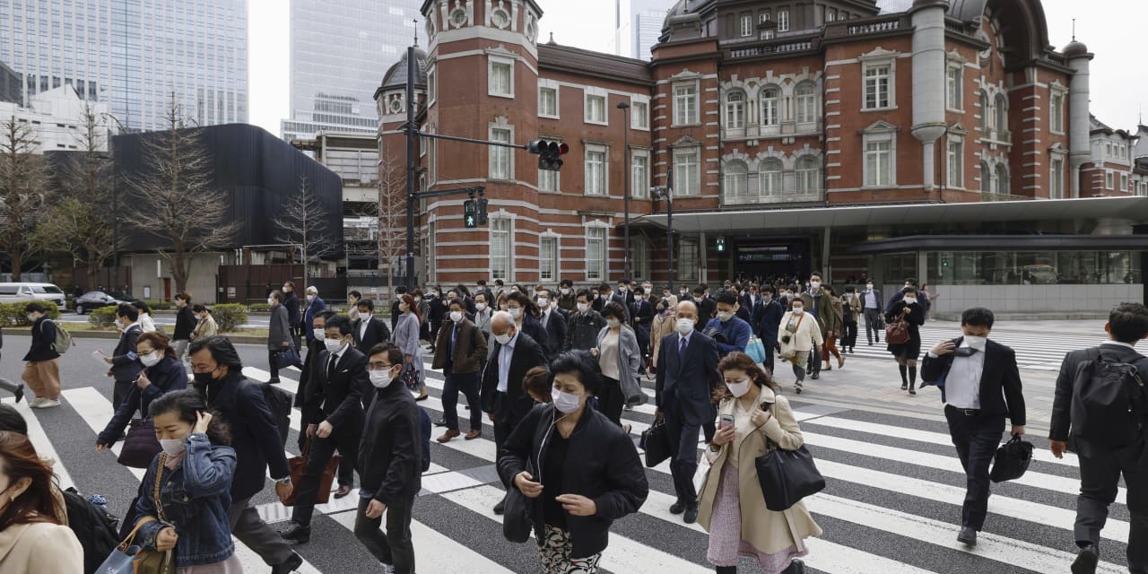 After 3 years, Japan lifts COVID mask rules — but most people are still wearing them