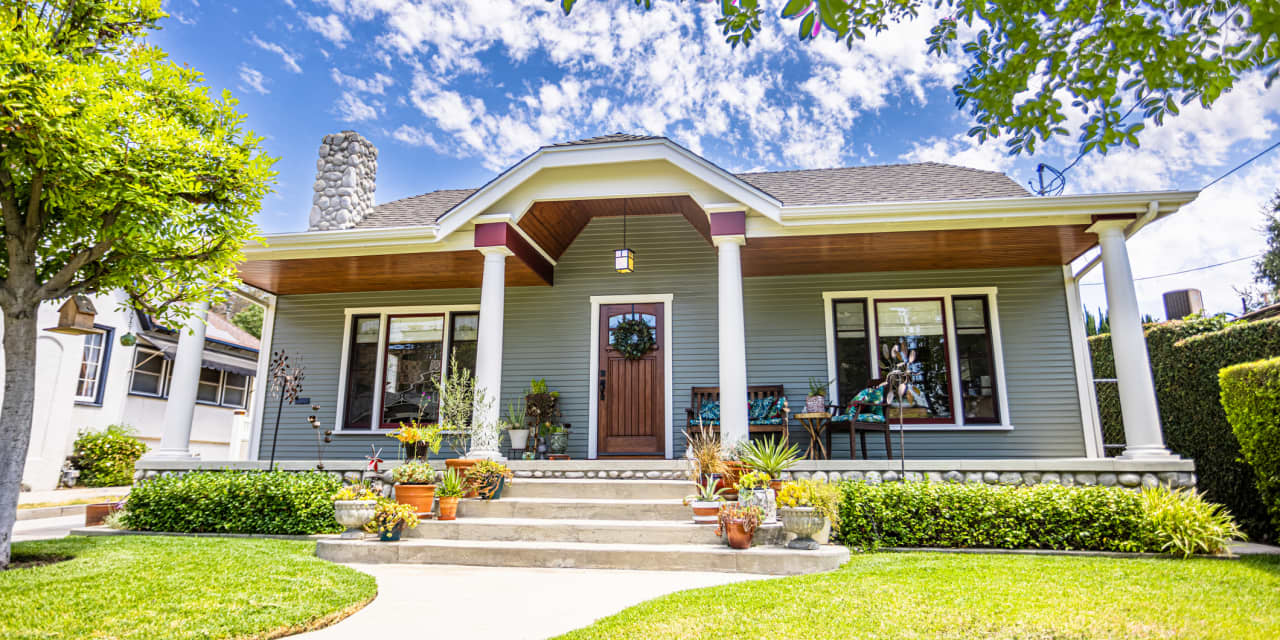 ‘We’ll see continued softness in home prices.’ 6 economists and real estate pros on what to expect from the housing market this summer