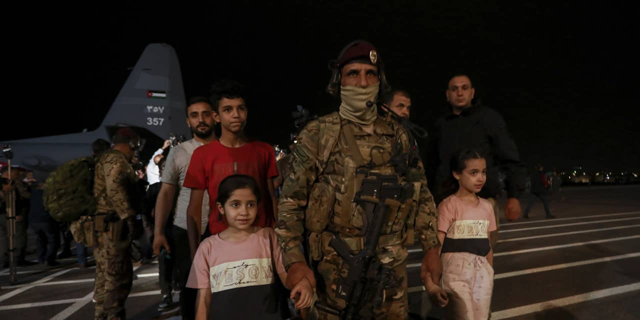 Sudanese seek refuge from civil strife as foreigners are airlifted out ...