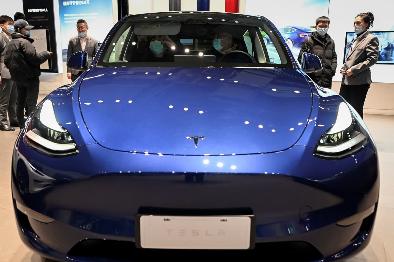 Tesla cuts prices for some Model Y versions in China, as price war ramps  back up - MarketWatch