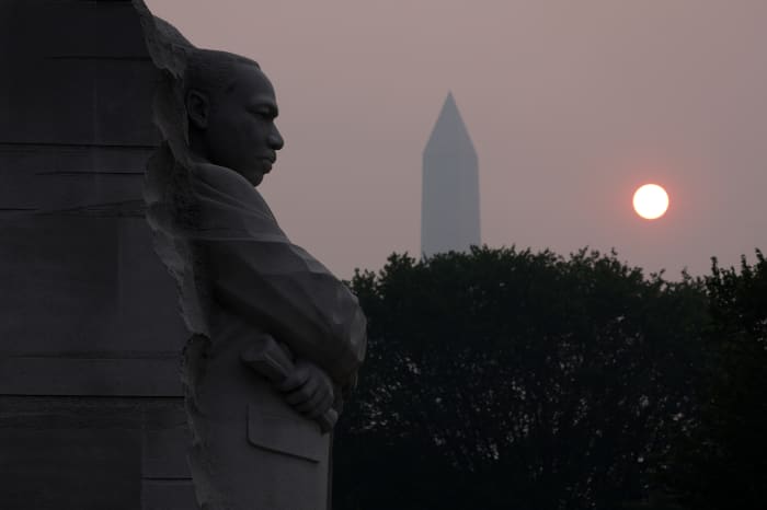 NYC landmarks are blanketed in smoke pouring across the Northeast from  Canadian wildfires