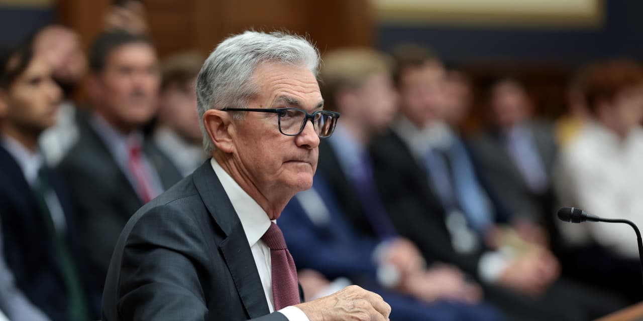 Powell says he sees a path where inflation cools without significant job losses