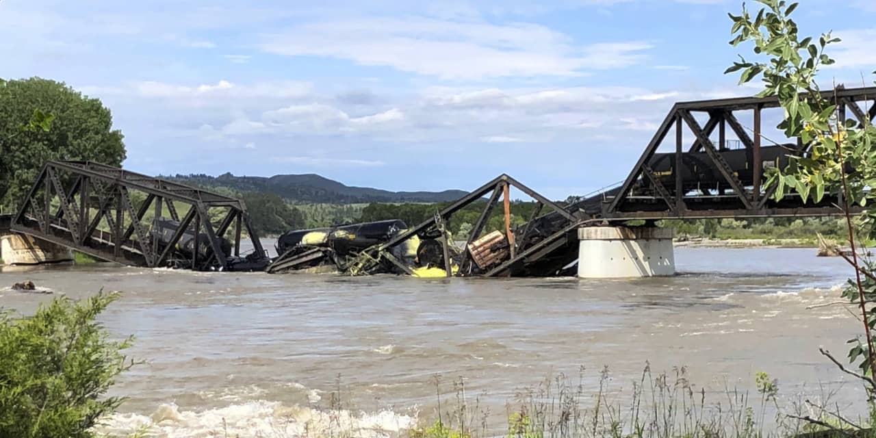 Bridge over Yellowstone River in Montana collapses, sending a freight train into the waters below