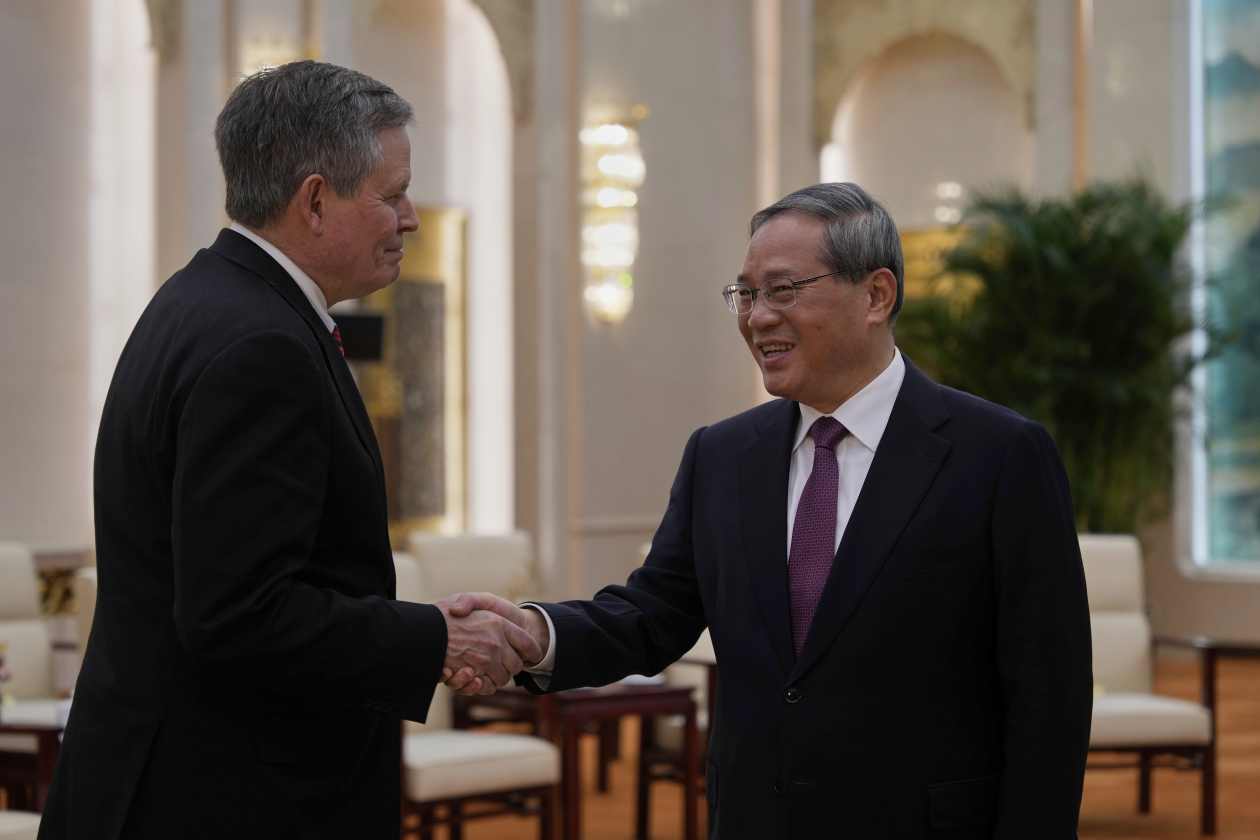 China’s premier meets with U.S. delegation, urges ‘dialogue over ...
