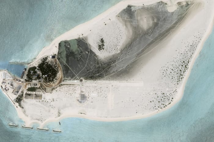 China appears to be building airstrip on disputed South China Sea