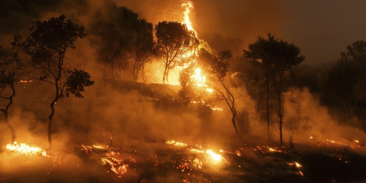 18 bodies found in Greece as firefighters battle wind-driven wildfires