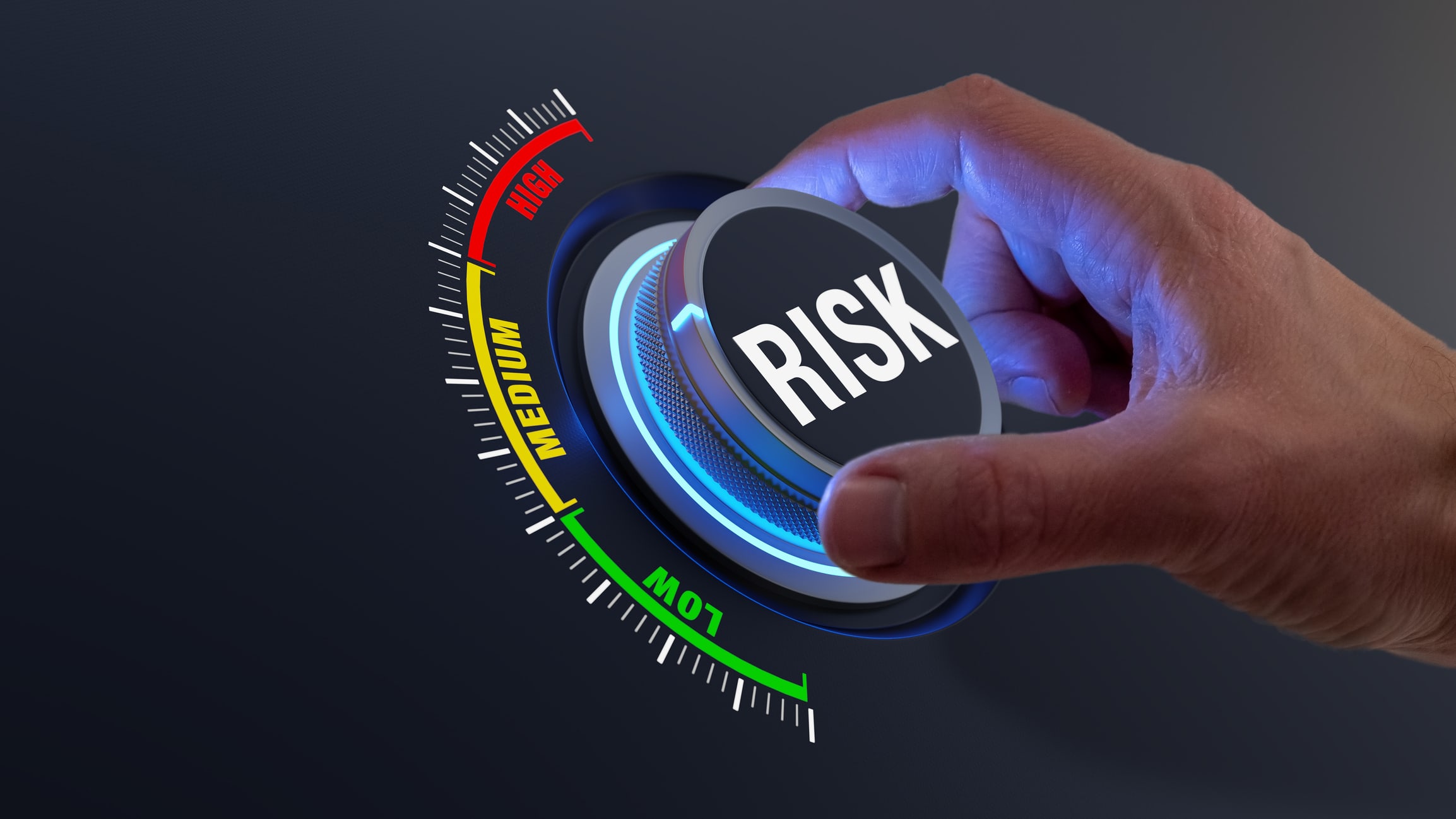 Illustration of a hand turning a "RISK" knob from high to low.