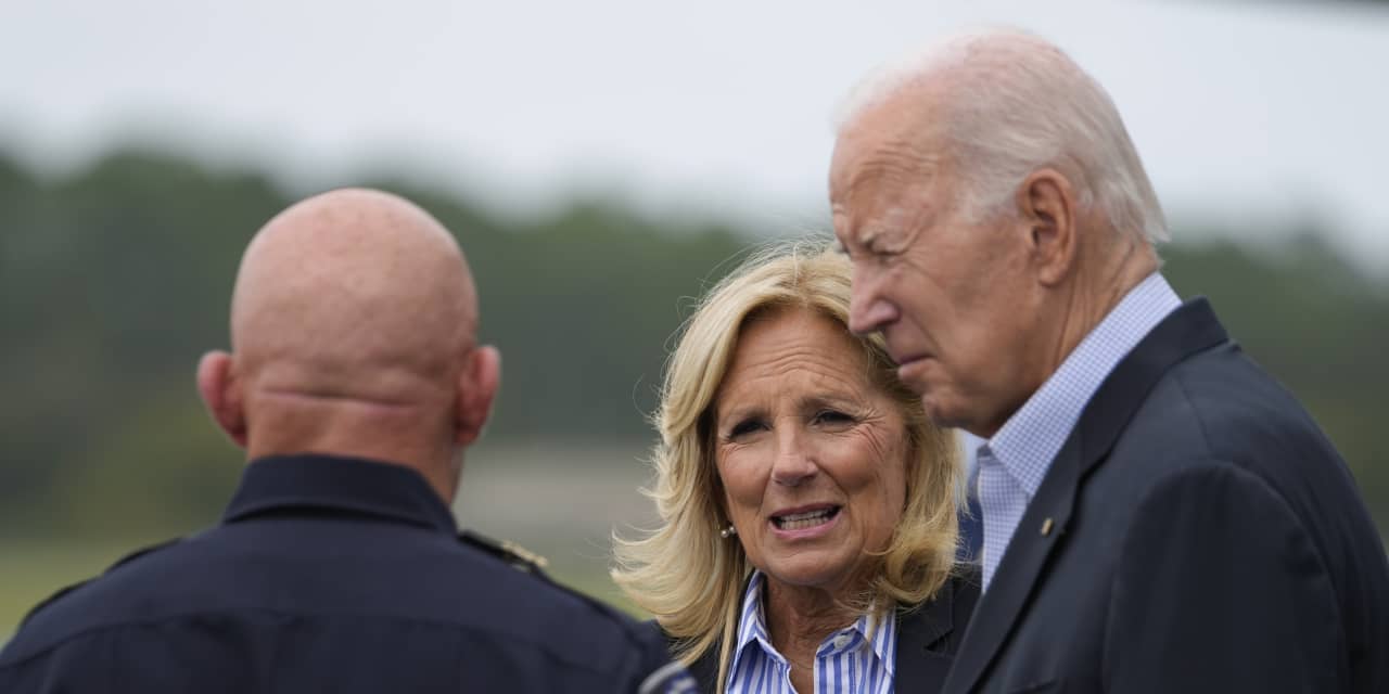 Biden surveys hurricane’s toll from the sky and on the ground in Florida. DeSantis opts out of meeting.