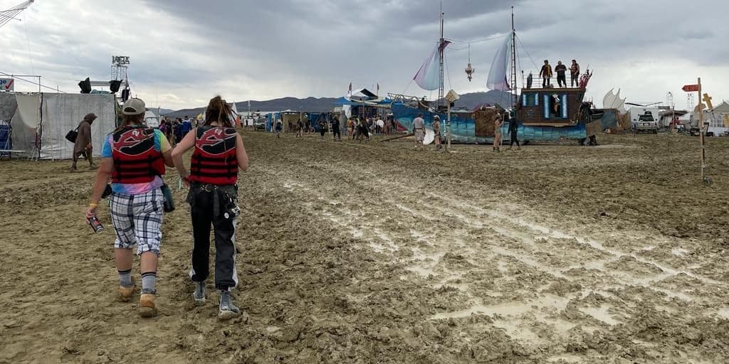 Tens of thousands stranded by flooding at Burning Man; authorities investigating 1 death