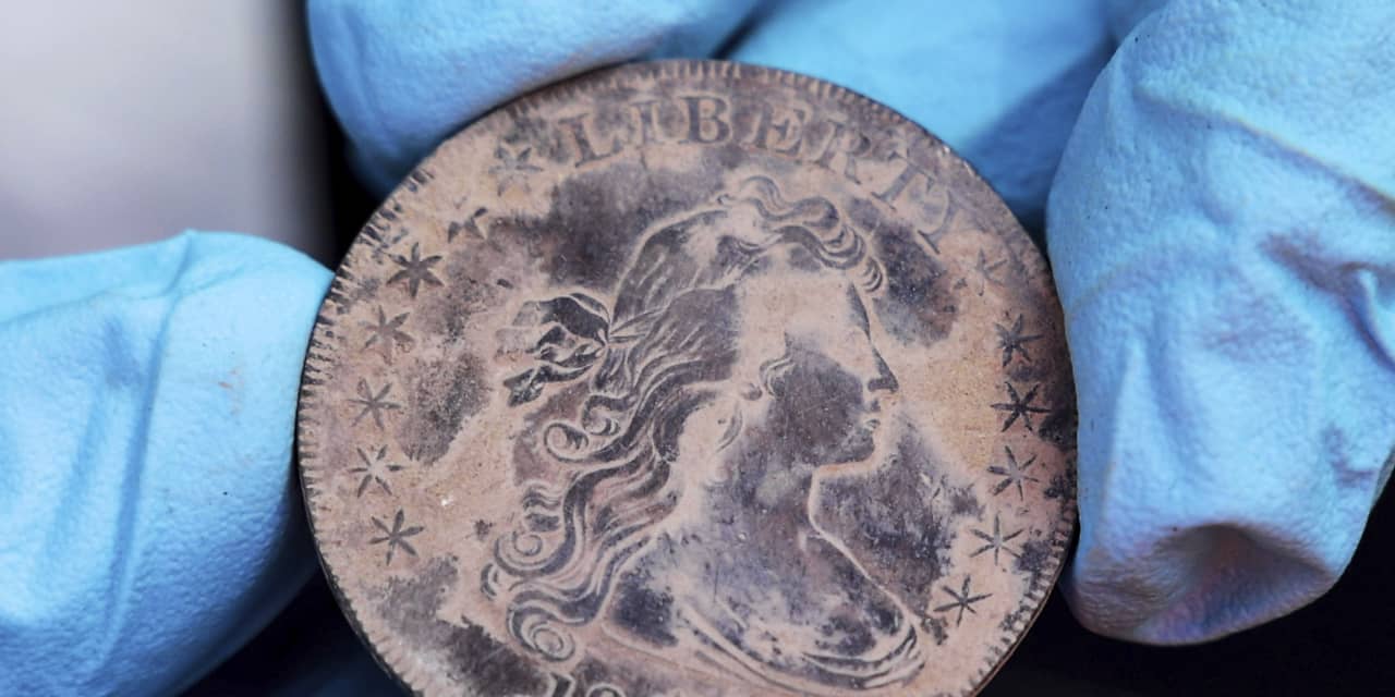 Thought empty, West Point time capsule yields centuries-old coins beneath silt