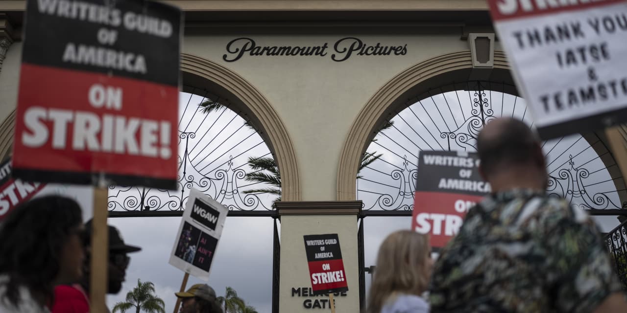 Striking screenwriters wait to learn terms of deal with Hollywood studios