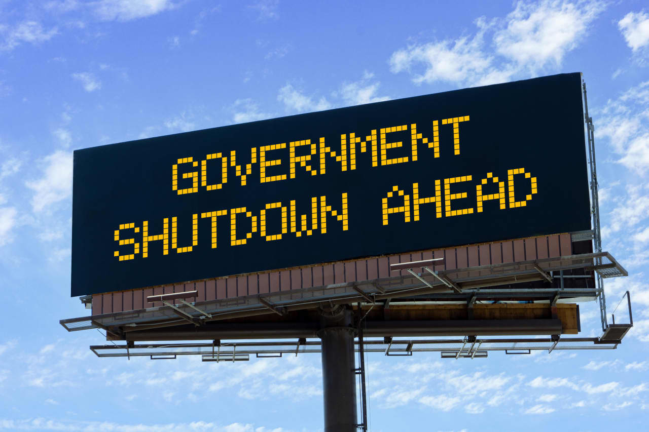 How badly could mass layoffs during a government shutdown hurt the stock market? Here’s what experts say.