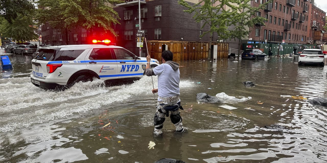 New York stunned and swamped by record-breaking rainfall as more downpours expected