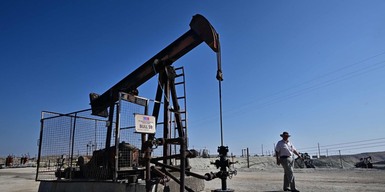 Oil prices extend decline after demand worries spark sharp pullback