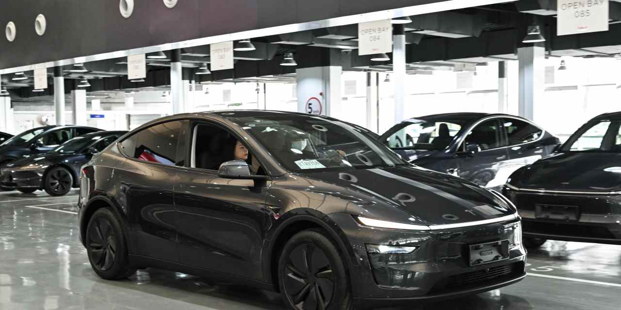 Tesla needs a blockbuster EV to break a sales slump. Can a stripped-down ...