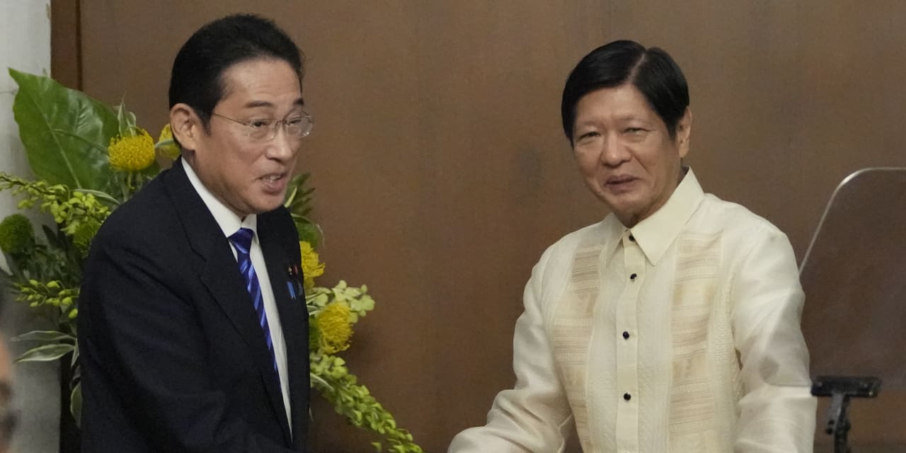 Leaders of Japan and Philippines agree to work on joint defense pact amid alarm over China