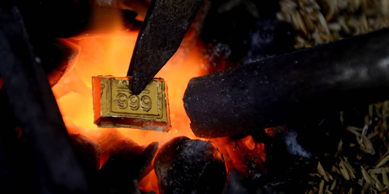 Gold futures soar to record close. Here’s what’s driving the rally.