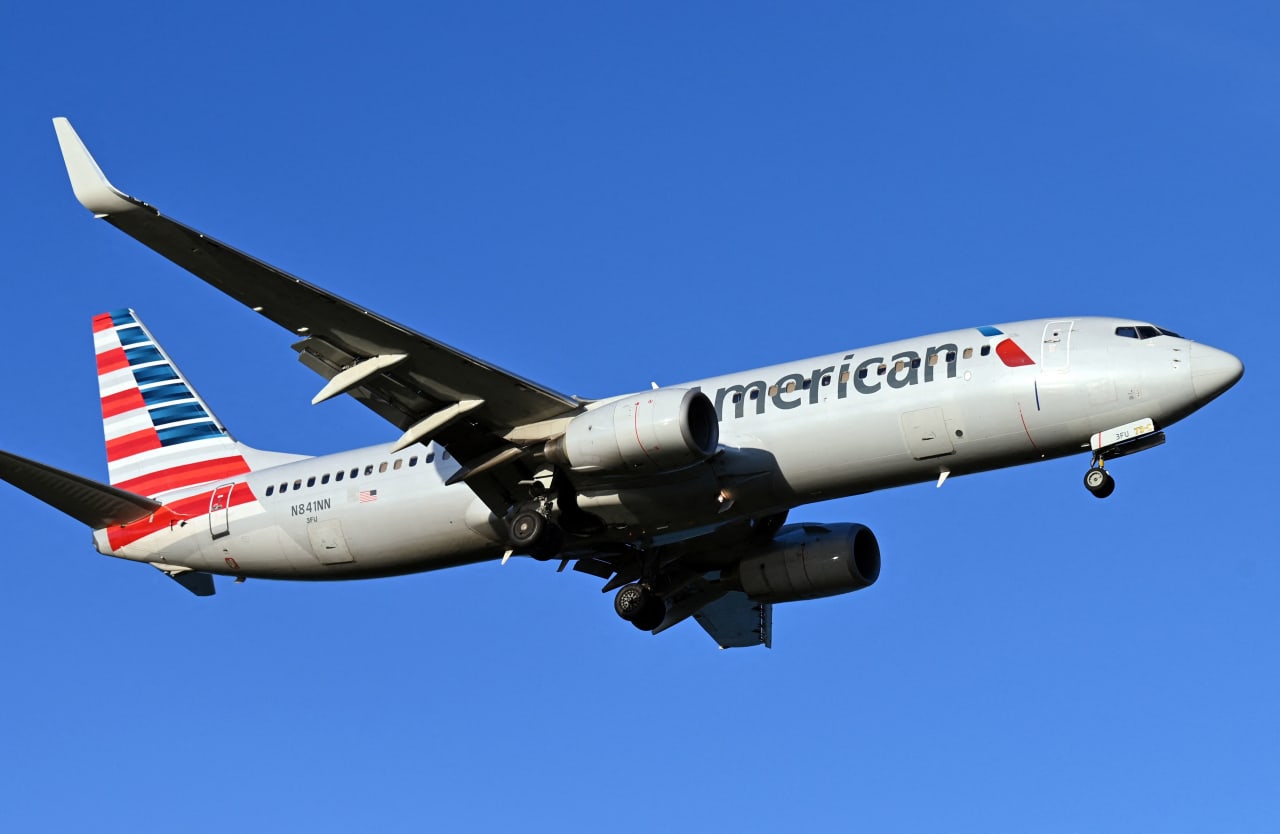 American Airlines’ stock jumps after an upbeat profit outlook and record revenue