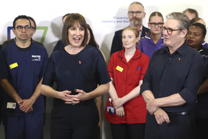 Britain’s prime minister Keir Starmer and chancellor Rachel Reeves speak with members of staff during a visit to University Hospital Coventry and Warwickshire